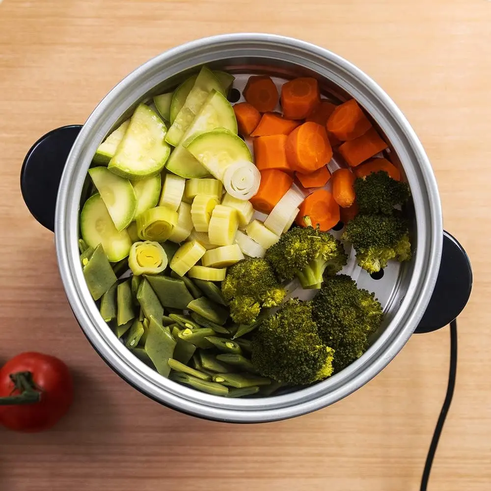 verduras mezcladas y cocidas al vapor en el recipiente de vapor de la arrocera cecotec